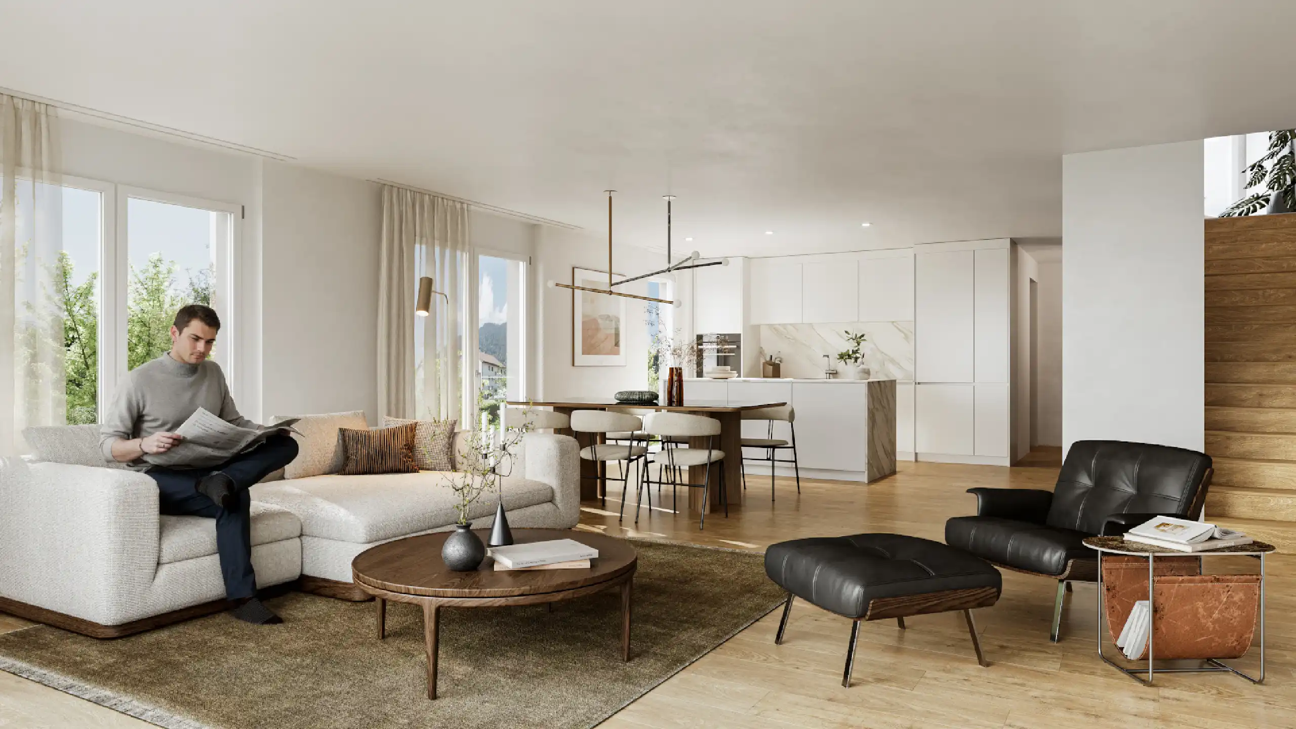 Moderner Wohnzimmerbereich mit offener Küche, Sofa, Couchtisch und eleganten Möbeln in heller, wohnlicher Einrichtung.